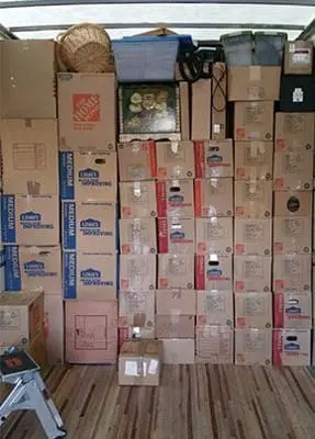 A wall of boxes stacked on top of each other.